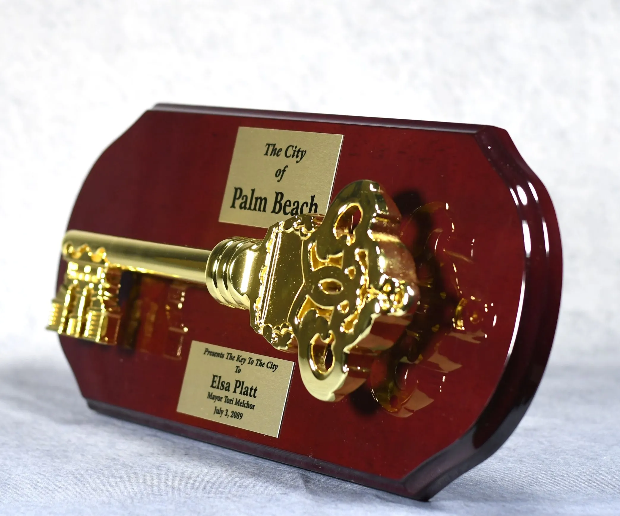 Gold Key Mounted on Rosewood Plaque