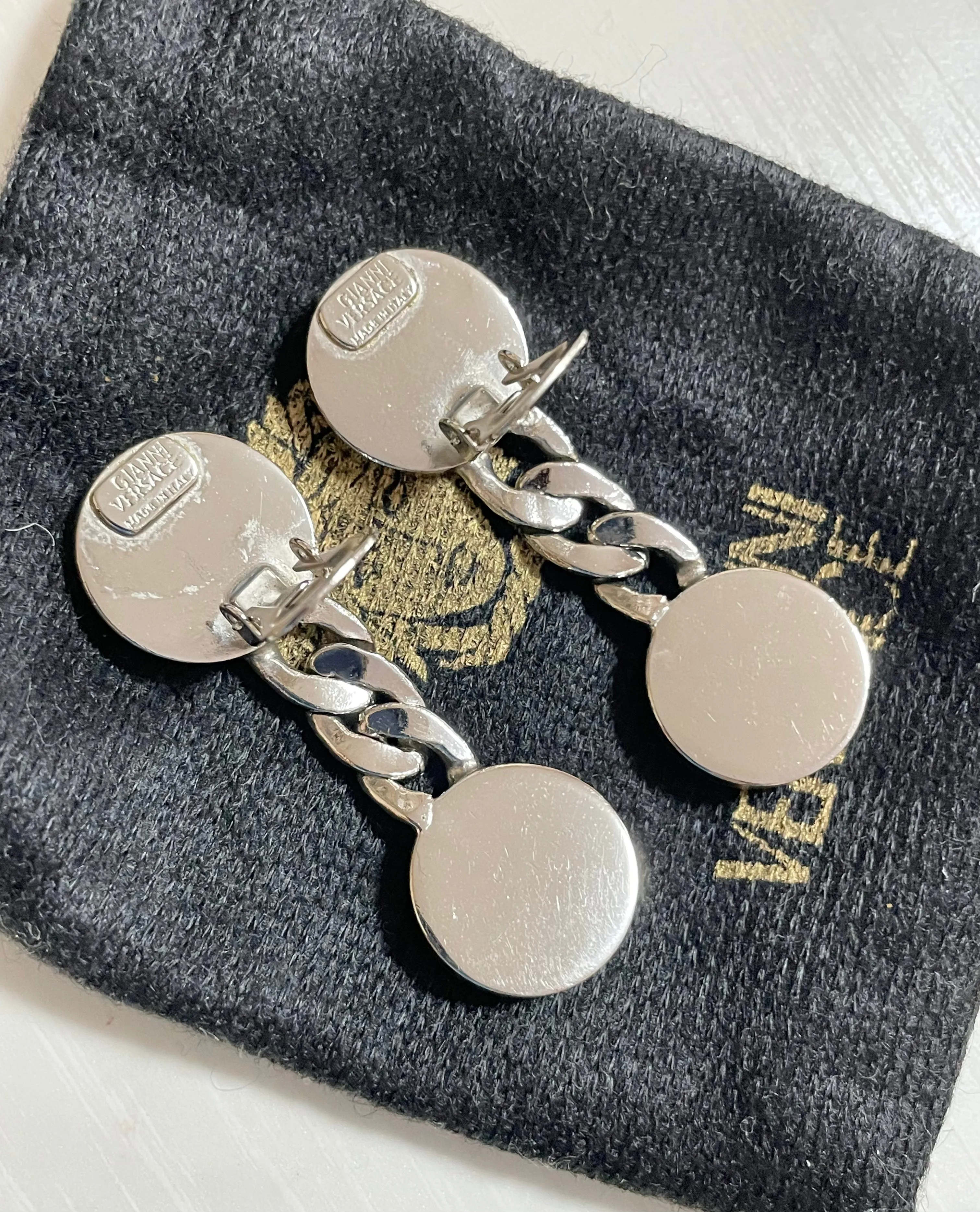 Vintage Gianni Versace silver dangle earrings with medusa faces and chain motif. Must have Lady Gaga style jewelry piece. 050601ya2