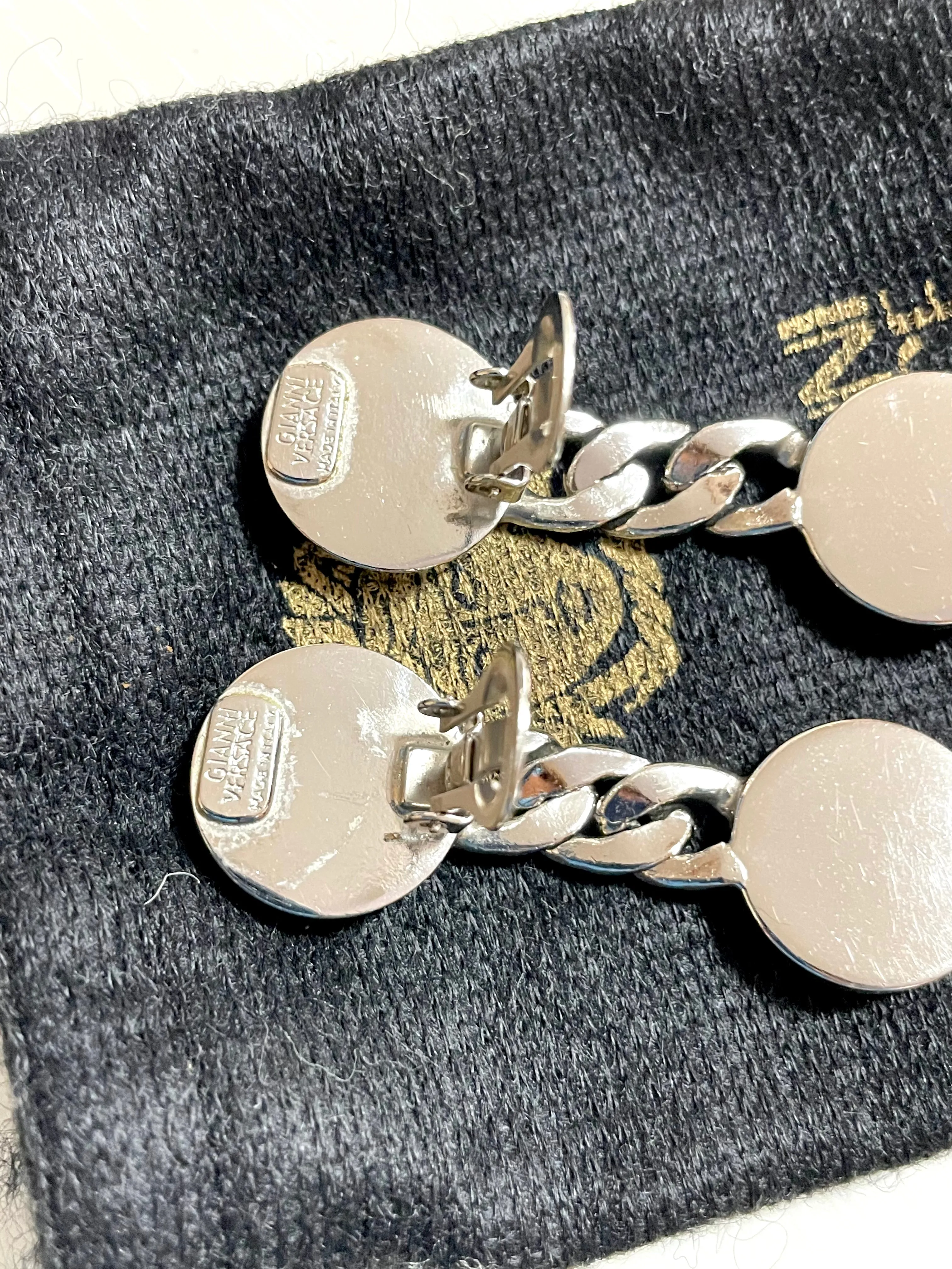 Vintage Gianni Versace silver dangle earrings with medusa faces and chain motif. Must have Lady Gaga style jewelry piece. 050601ya2