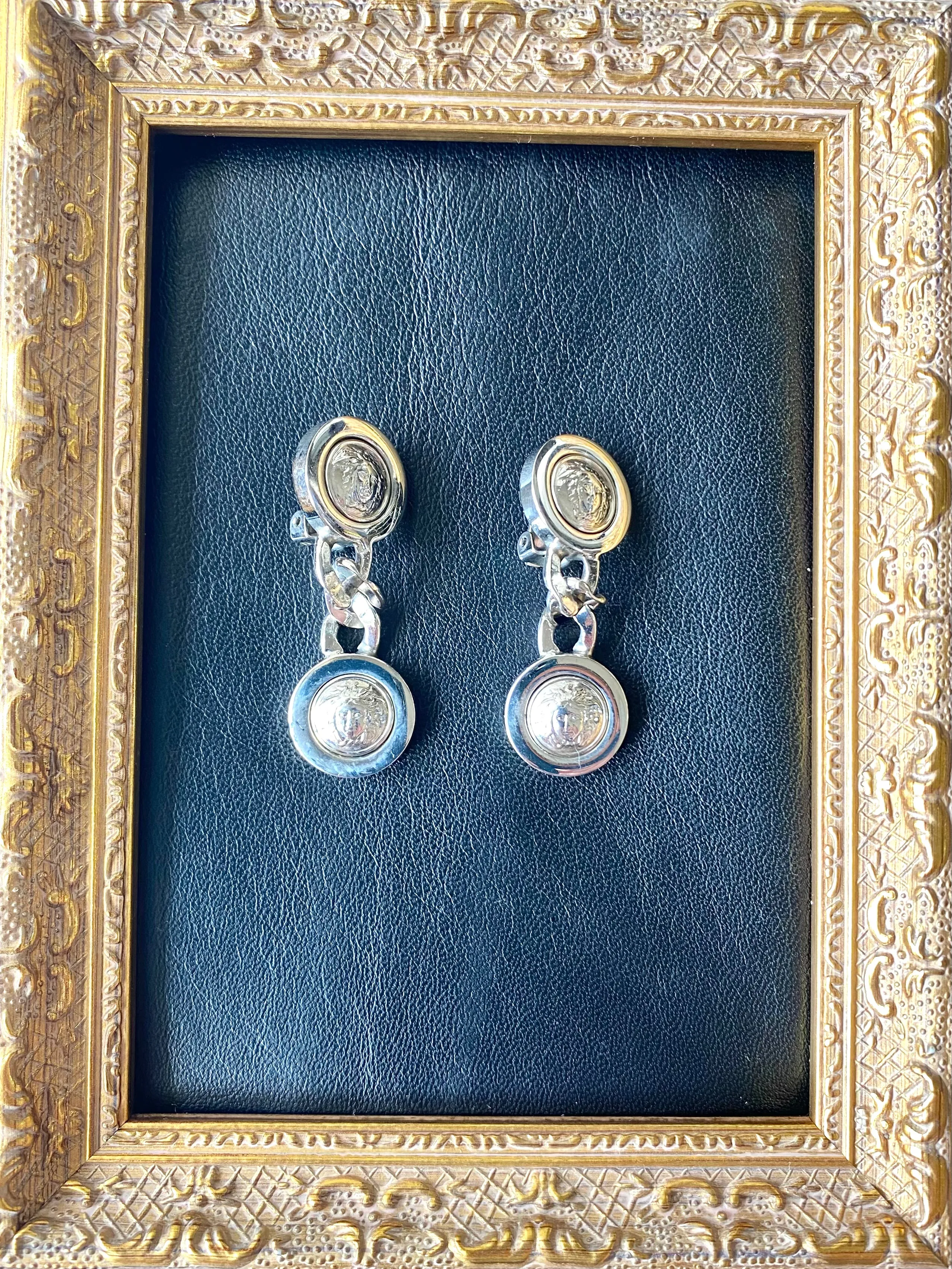 Vintage Gianni Versace silver dangle earrings with medusa faces and chain motif. Must have Lady Gaga style jewelry piece. 050601ya2